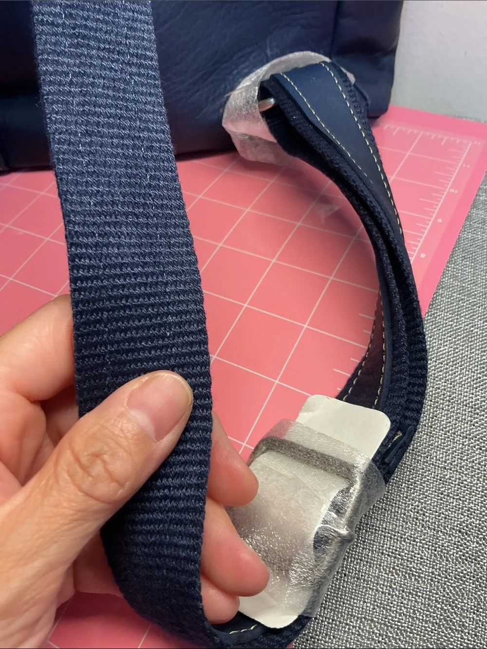 Navy blue leather backpack